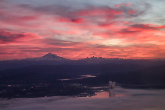 Sunrise clouds over BLI with Mount Baker on the horizon